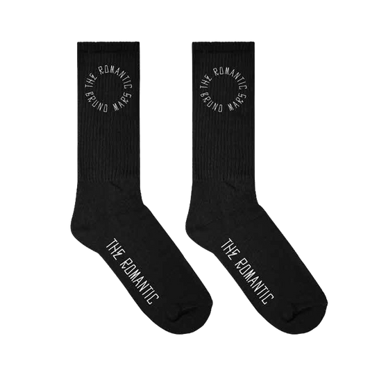 Unisex black socks with "The Romantic Bruno Mars" art printed on ankles and "The Romantic" printed on sole.
