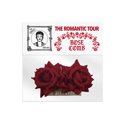 Rose comb hair accessory inside clear packaging with "The Romantic Tour" label closure.
