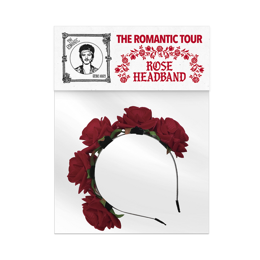 Rose headband hair accessory inside clear packaging with "The Romantic Tour" label closure.